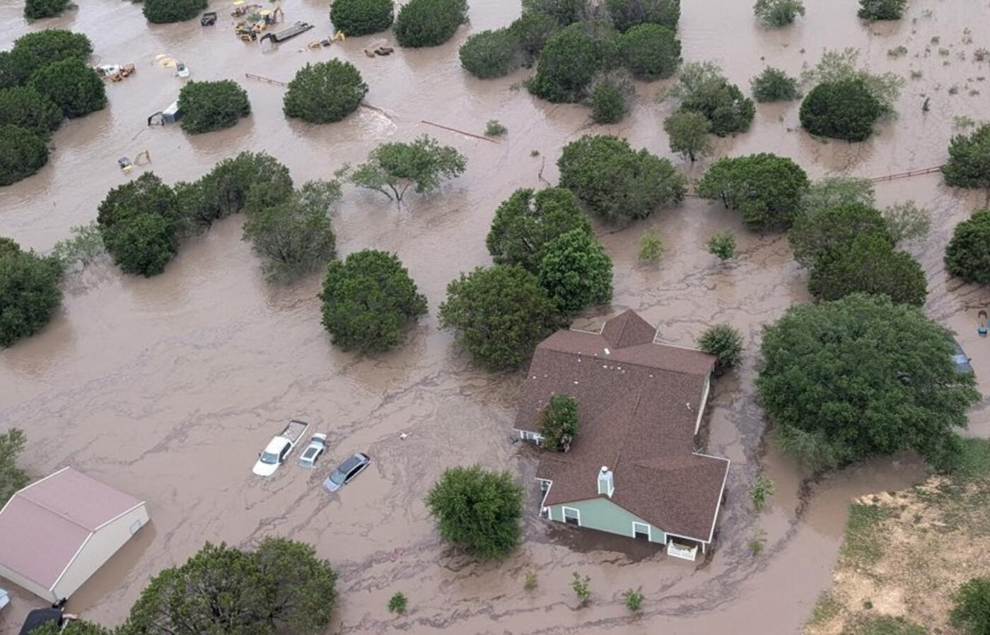 The flooded Guadalupe River near Kerrville, Texas, is shown in this July 5, 2025, photo provided by the United States Coast Guard.