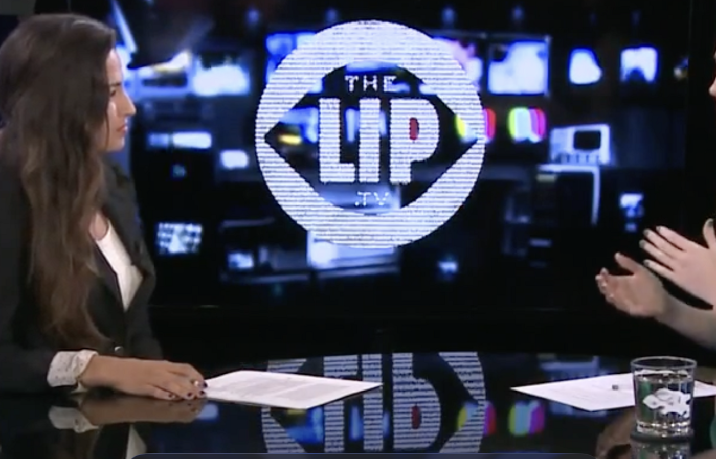 Two women discuss assisted suicide on a news program-style video.