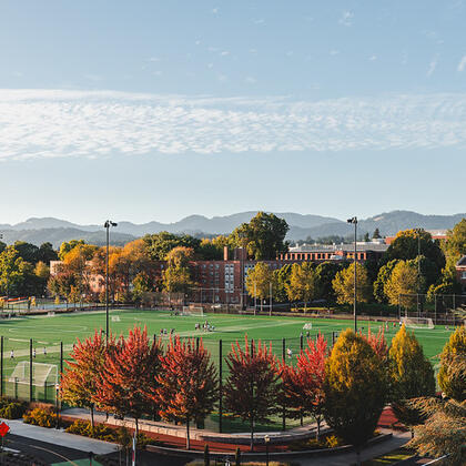 Corvallis campus with sports fields, trees and hills