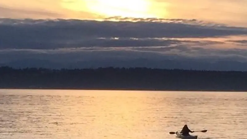 Paddling on Puget Sound, photo by Steve Lundeberg