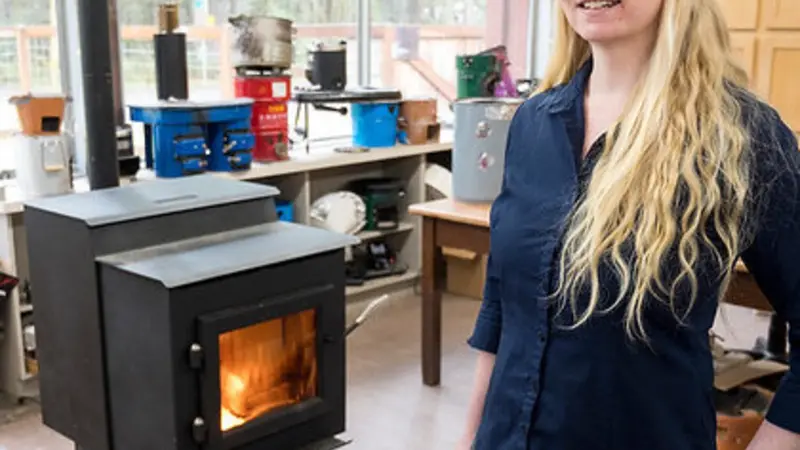 Nordica MacCarty is working on making wood stoves burn more cleanly and efficiently. Photo by Karl Maasdam.