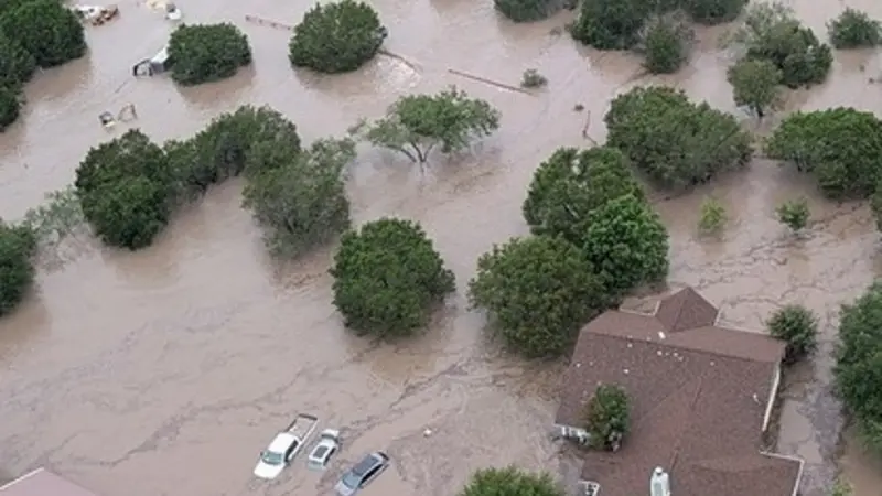The flooded Guadalupe River near Kerrville, Texas, is shown in this July 5, 2025, photo provided by the United States Coast Guard.