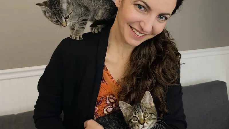 Monique Udell with two cats
