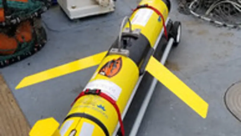 Bright yellow ocean glider to collect scientific data in the ocean.