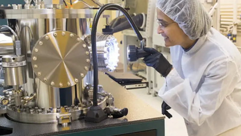 OSU professor of electrical engineering and computer science Pallavi Dhagat will be a key member of OSU's team in a project to advance semiconductor technologies in the Northwest. She is seen depositing a magnetic film for advanced memory devices (photo b