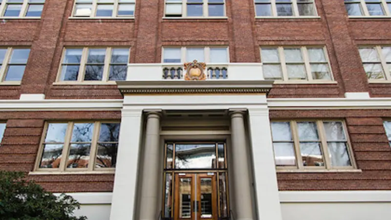 Stock image of Milam Hall, red-brick building at OSU
