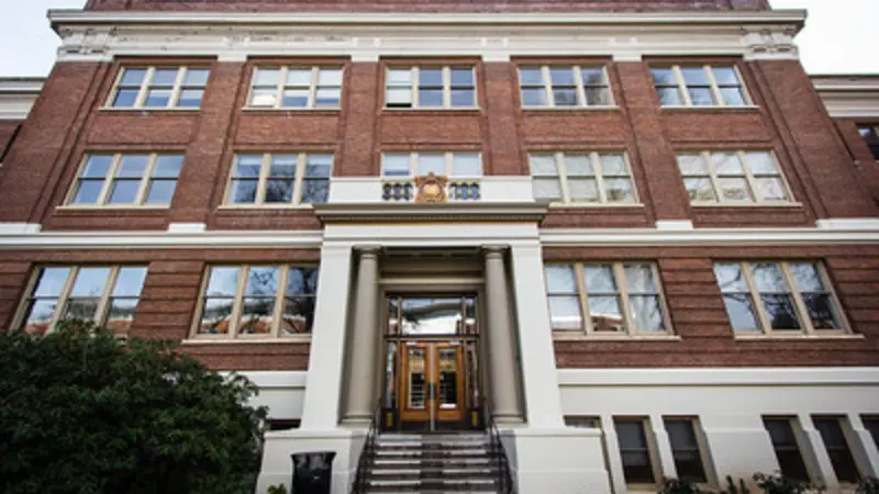 Stock image of Milam Hall, red-brick building at OSU
