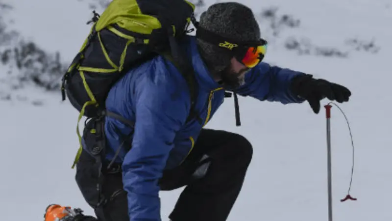 checking snow depth