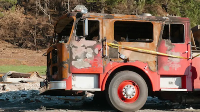 Image of the burned-out front half of a fire truck in Detroit, Oregon in 2020.