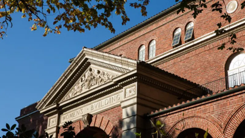 Looking up at the red-brick front of the Women's Building on OSU campus