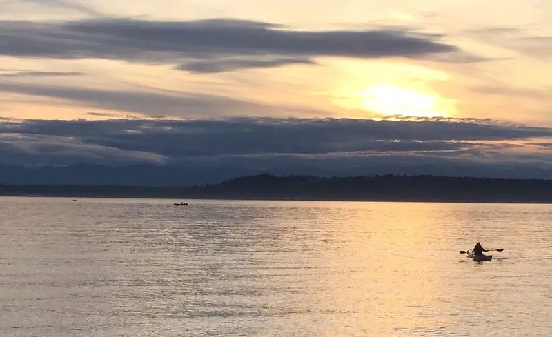 Paddling on Puget Sound, photo by Steve Lundeberg