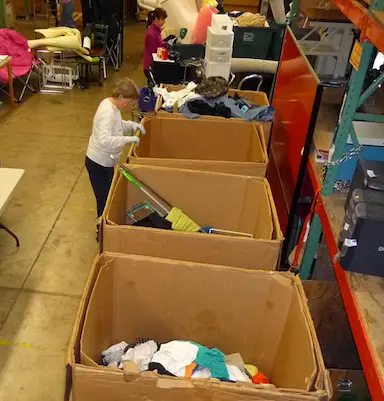 volunteers sorting boxes