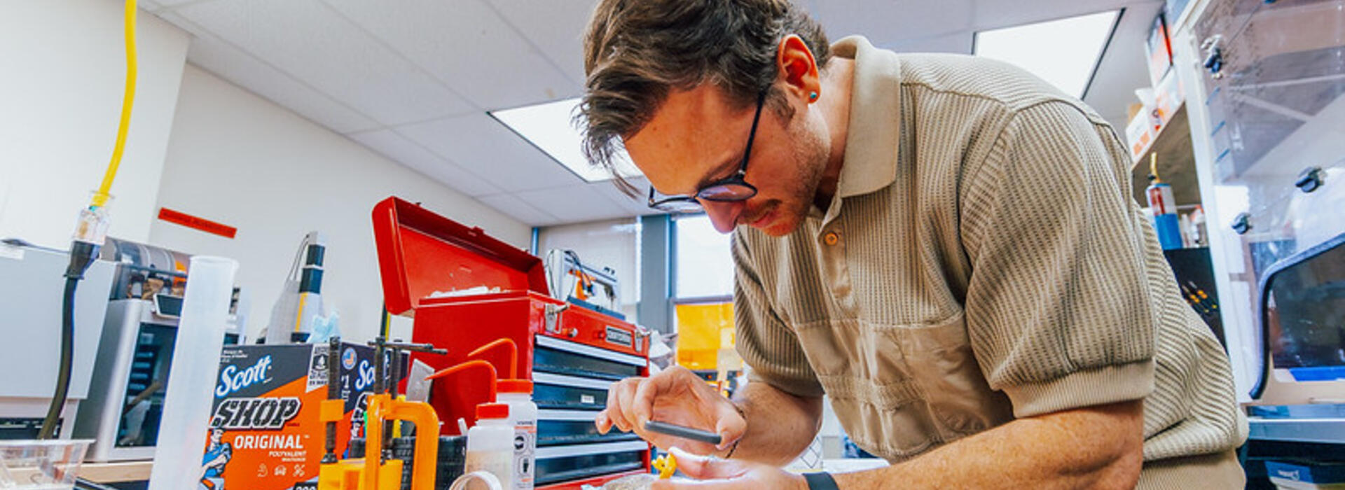 OSU researcher Devin Roach in the lab.