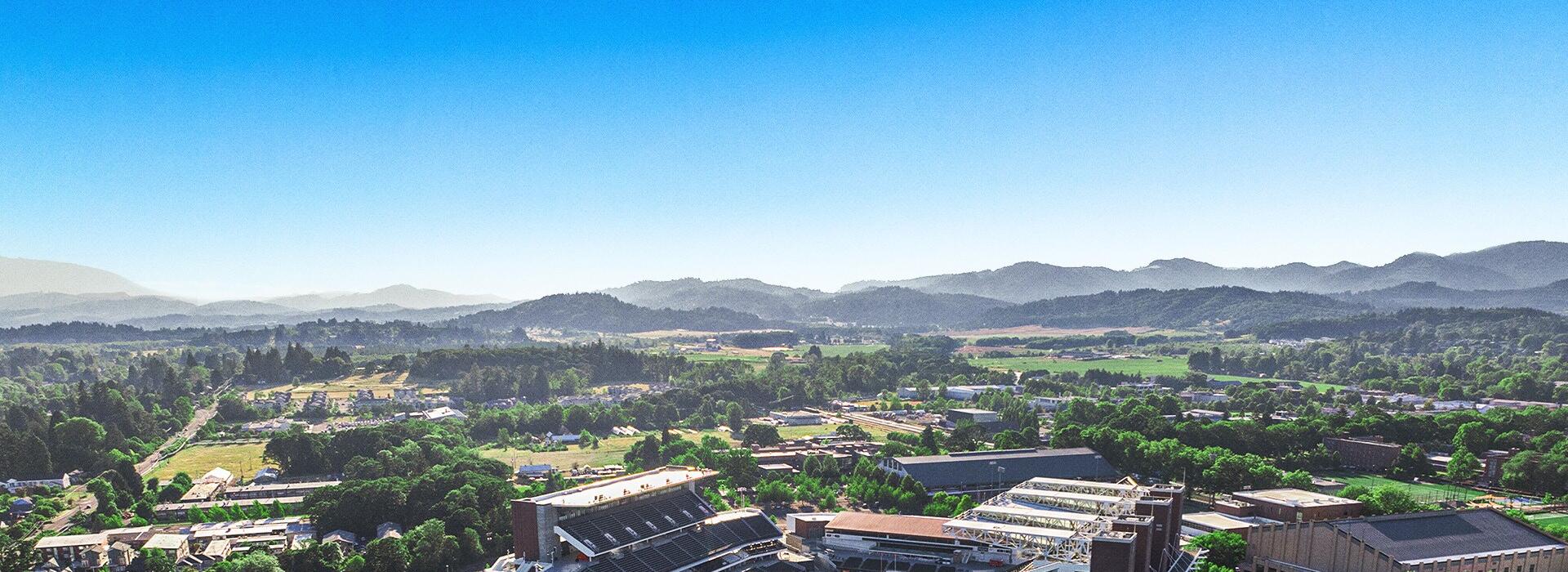Reser Stadium from the air with hills in background