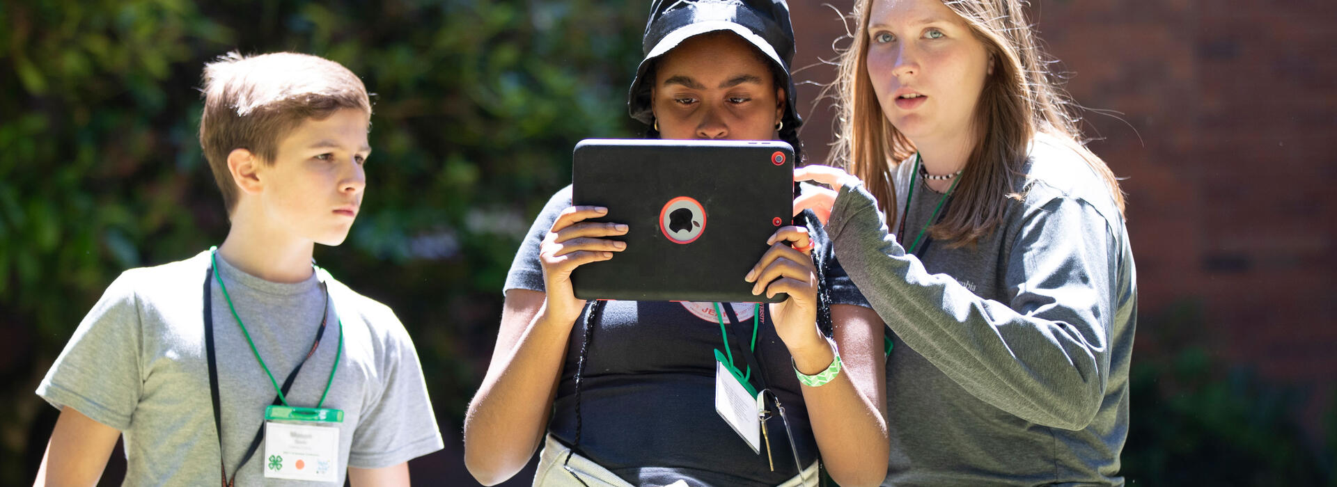 Oregon State University Extension Service 4-H'ers fly a drone. Photo by Amanda Loman.